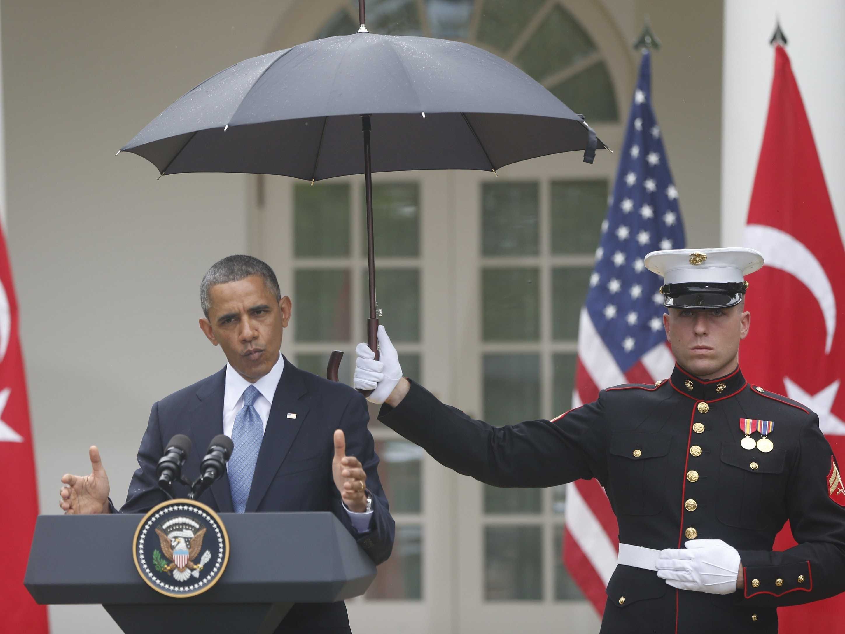 barack-obama-umbrella-press-conference-1.jpg